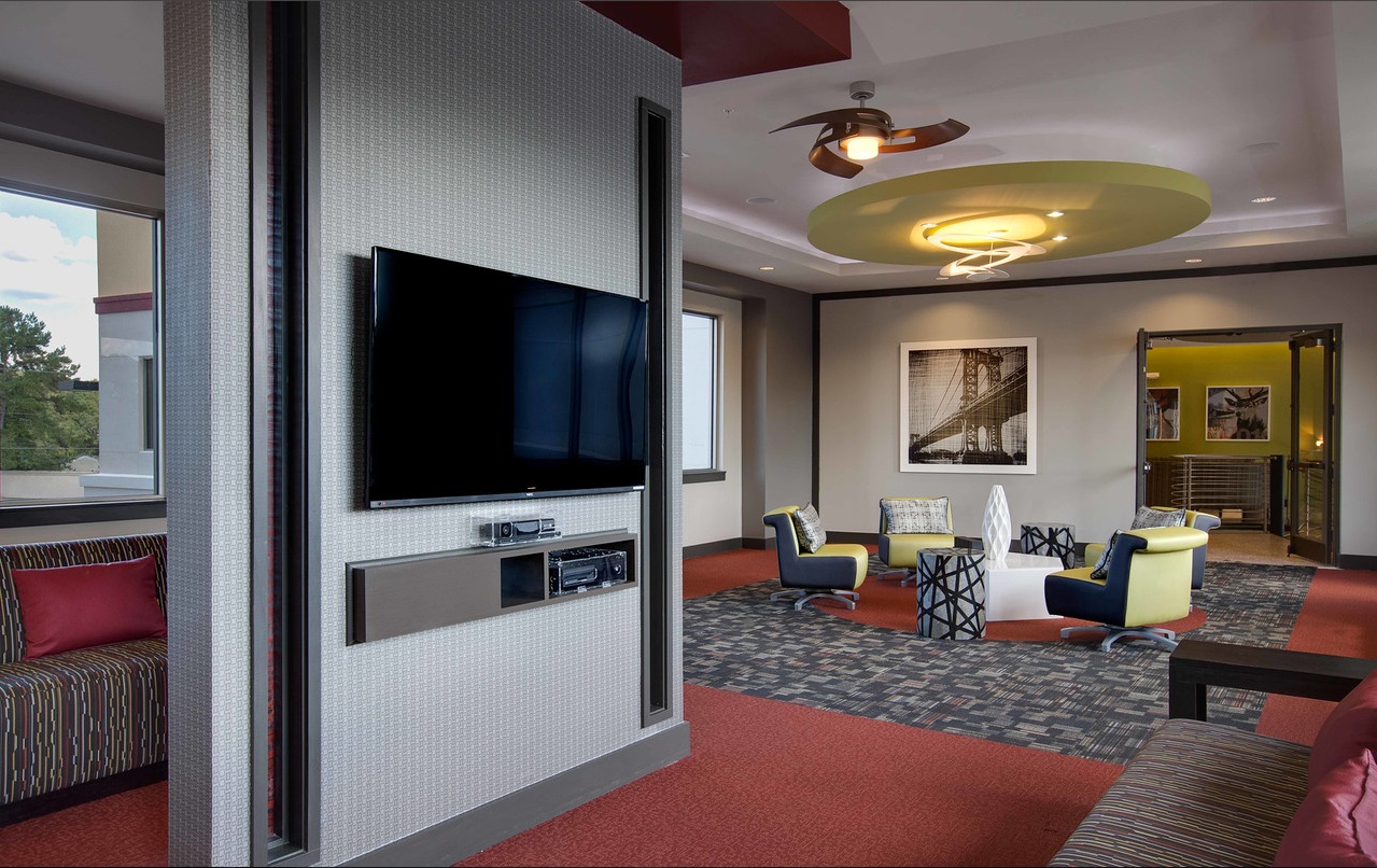 Multi-panel TV Entertainment Wall in Clubhouse